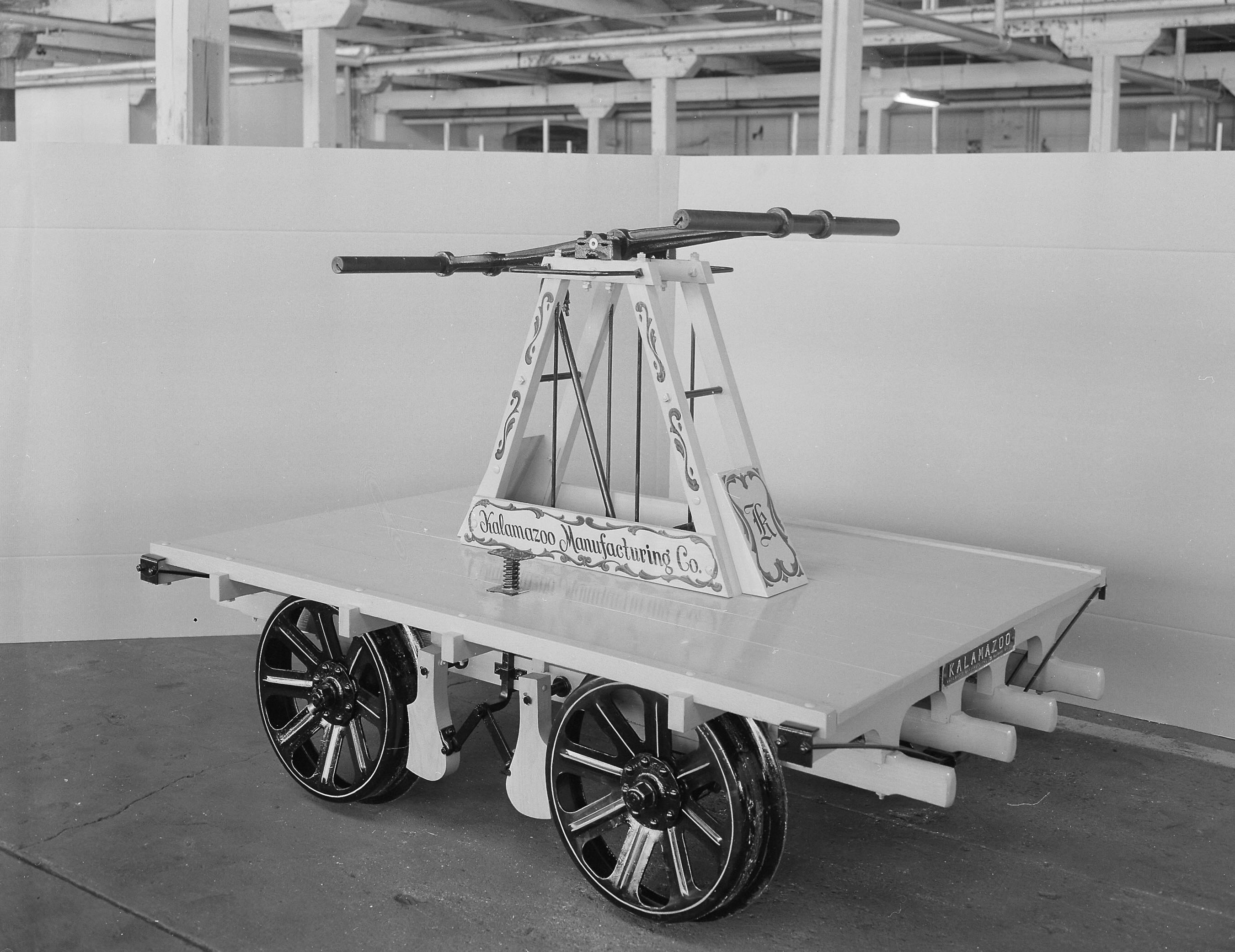 A handcar stamped with the logo of the Kalamazoo Manufacturing Company