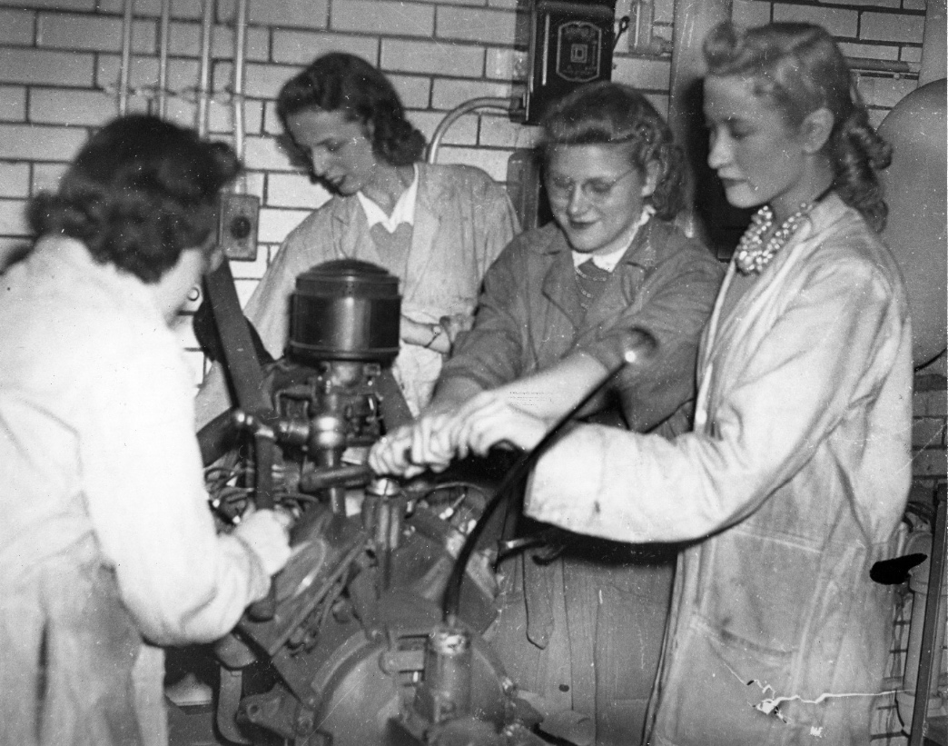 Working on an engine in the Engineering Lab